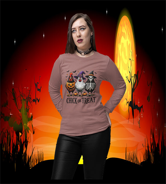 Woman wearing Mauve Chick or Treat Halloween shirt with chickens dressed as pumpkin, witch, and skeleton