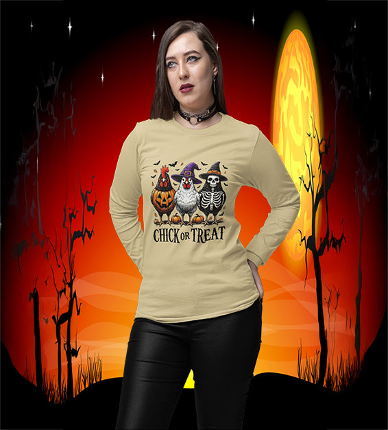 Woman wearing Soft Cream Chick or Treat Halloween shirt with chickens dressed as pumpkin, witch, and skeleton