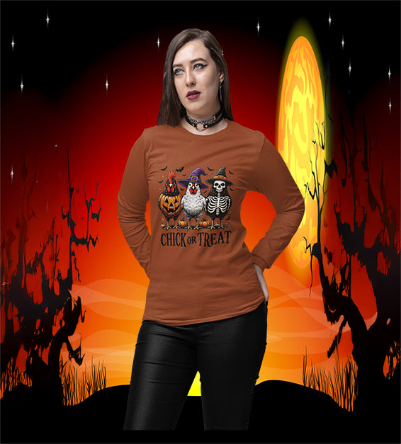 Woman wearing yellow Chick or Treat Halloween shirt with chickens dressed as pumpkin, witch, and skeleton
