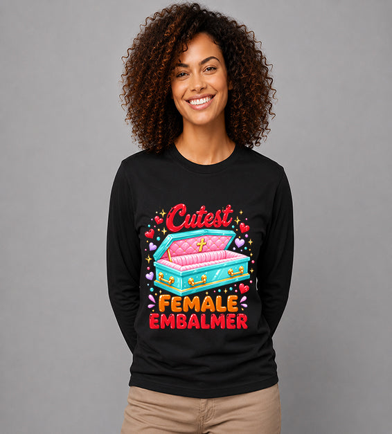 woman wearing black long sleeve t shirt featuring colorful cutest female embalmer graphic with decorative casket design