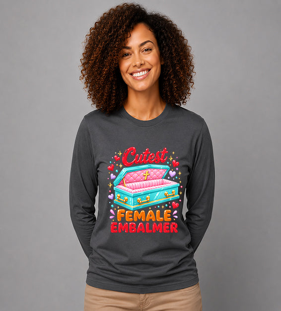 woman wearing dark grey long sleeve t shirt featuring colorful cutest female embalmer graphic with decorative casket design