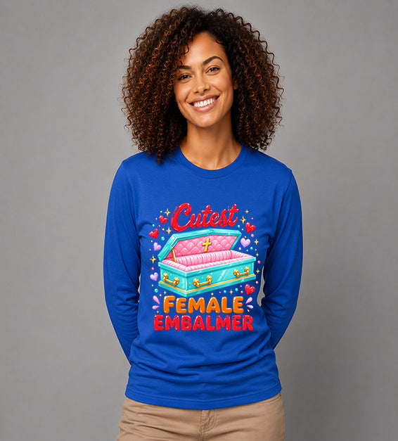 woman wearing royal blue long sleeve t shirt featuring colorful cutest female embalmer graphic with decorative casket design