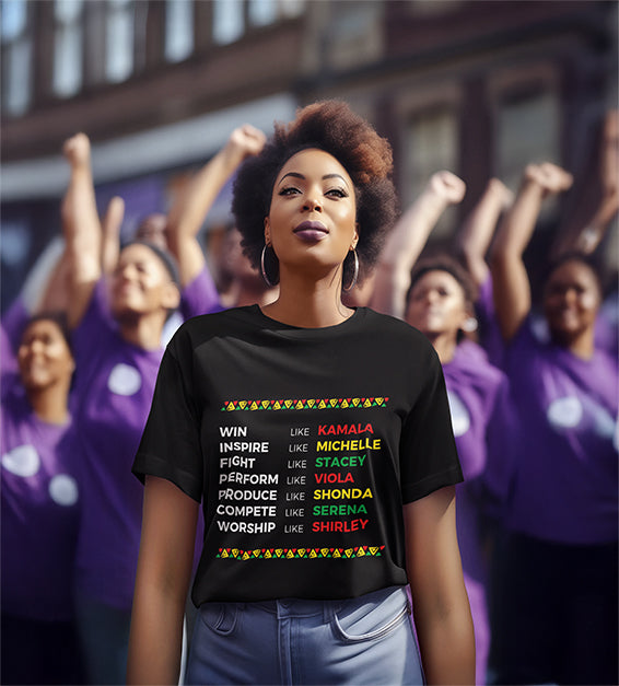 Black woman wearing a black t-shirt with a pink softball and “Strike Out” text – awareness graphic shirt