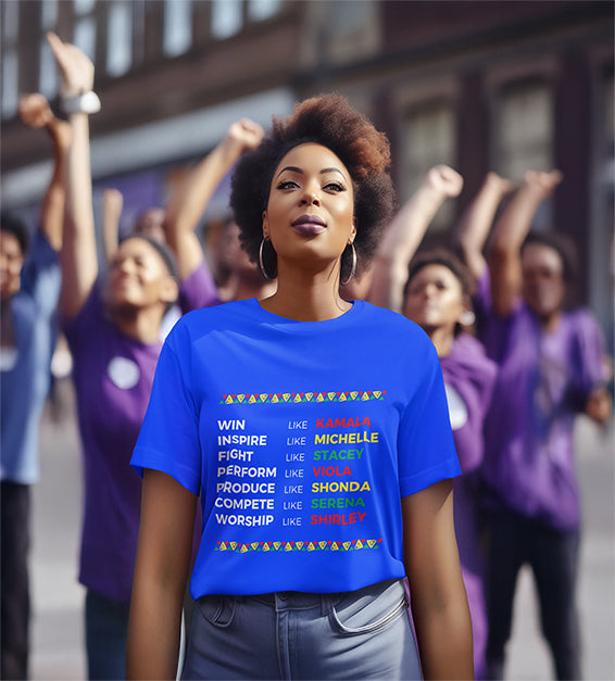 Black woman wearing a True Royal blue t-shirt with a pink softball and “Strike Out” text – awareness graphic shirt