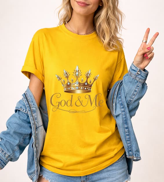 Young woman wearing gold God and Me crown graphic t-shirt with gold design, faith-based Christian apparel,