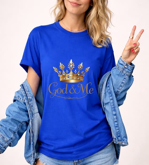 Young woman wearing true royal/blue God and Me crown graphic t-shirt with gold design, faith-based Christian apparel