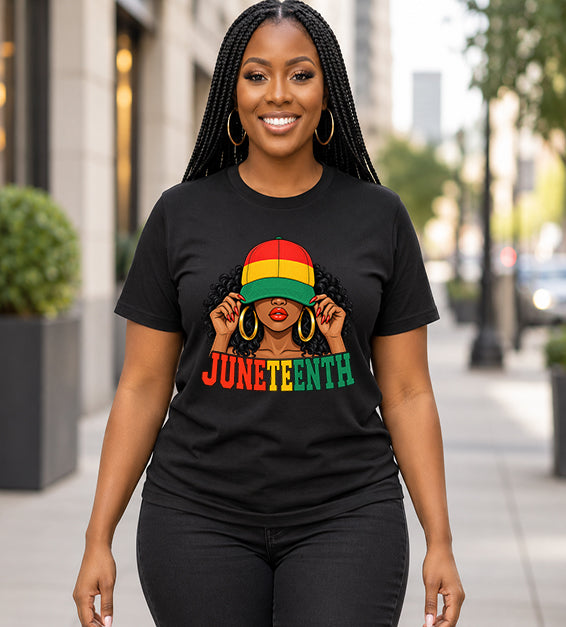 Black Juneteenth graphic T-shirt featuring illustrated woman in red, yellow and green cap worn by female