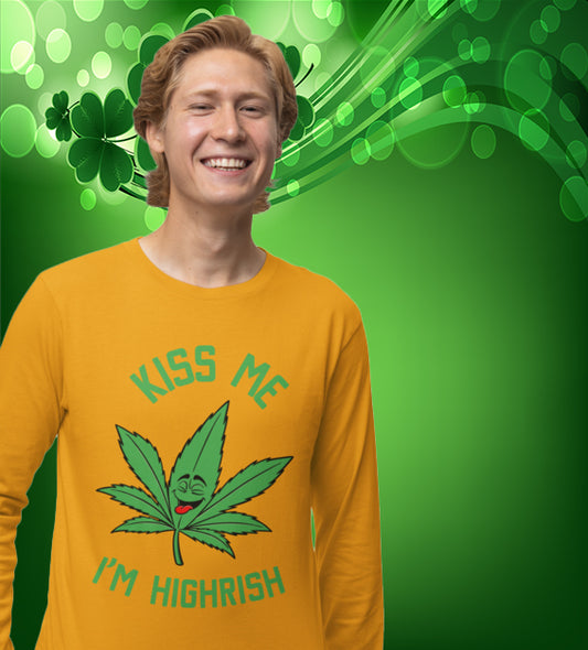  unisex t-shirt featuring a playful green cannabis leaf with a funny face, tongue out, and the words "Kiss Me I’m Highrish" in bold, festive lettering.