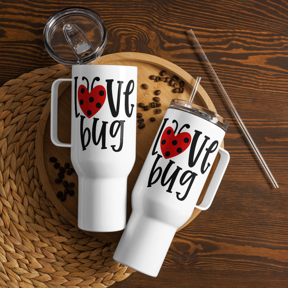 A 40 oz white travel tumbler featuring a cute "Love Bug" design with a heart-shaped ladybug, handle, and straw, perfect for keeping drinks hot or cold.