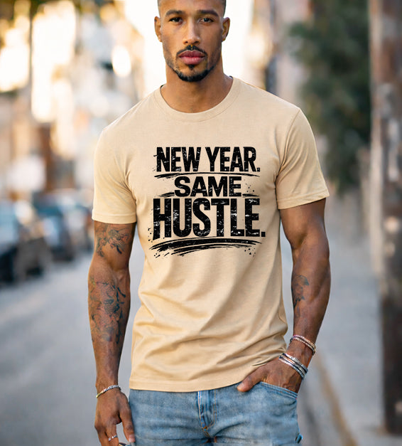 Athletic man wearing sand dune New Year Same Hustle motivational graphic t-shirt in urban street setting