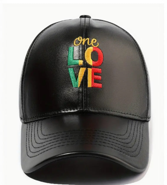 Black faux leather baseball cap with embroidered “One Love” in red, yellow, and green Rasta colors.