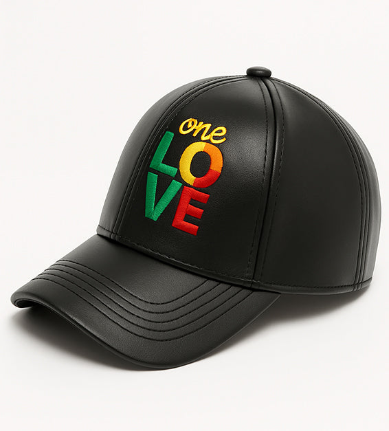 Black faux leather baseball cap with embroidered “One Love” in red, yellow, and green Rasta colors.