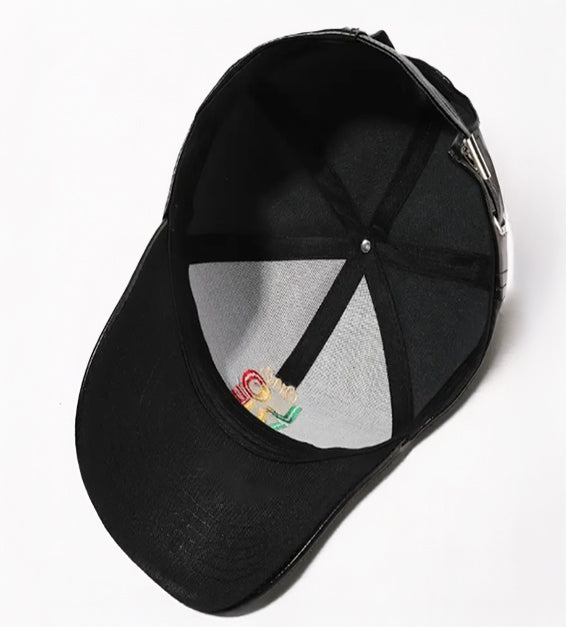 Black faux leather baseball cap with embroidered “One Love” in red, yellow, and green Rasta colors.